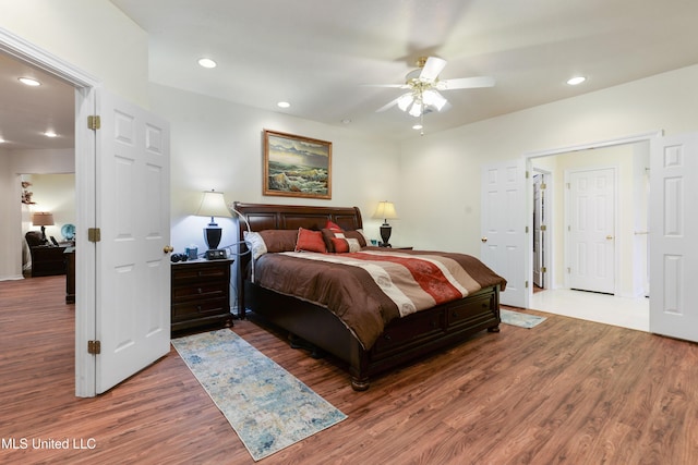 bedroom featuring dark wood-type flooring and ceiling fan