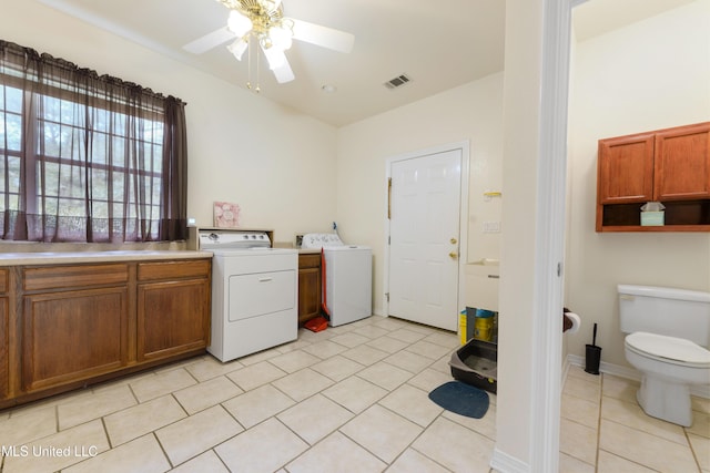 laundry area featuring light tile patterned flooring, ceiling fan, and independent washer and dryer