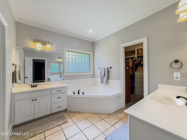 66 Auburn Pl, Hattiesburg, MS 39402 - full bathroom with two vanities, tile patterned flooring, a bath, crown molding, and a walk in closet