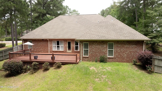 66 Auburn Pl, Hattiesburg, MS 39402 - back of house with a wooden deck, brick siding, and roof with shingles