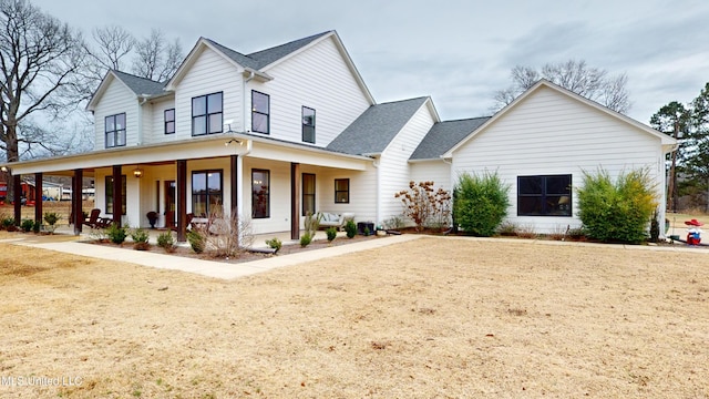 modern inspired farmhouse featuring a porch