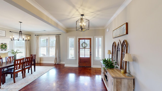 entryway featuring a notable chandelier and crown molding