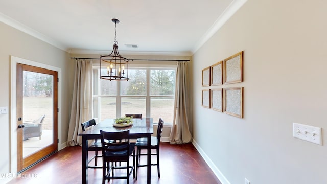 dining area with a wealth of natural light, crown molding, a chandelier, and dark hardwood / wood-style floors