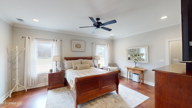 bedroom featuring ceiling fan, wood-type flooring, and ornamental molding