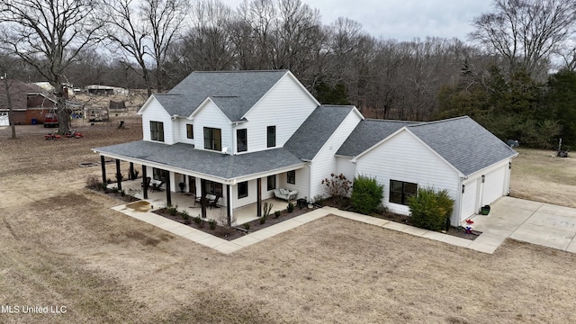 exterior space with a front yard and covered porch