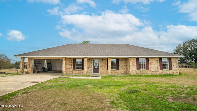 8 Skeeter Ln, Carriere, MS 39426 - view of front of property with driveway, a front yard, brick siding, and roof with shingles