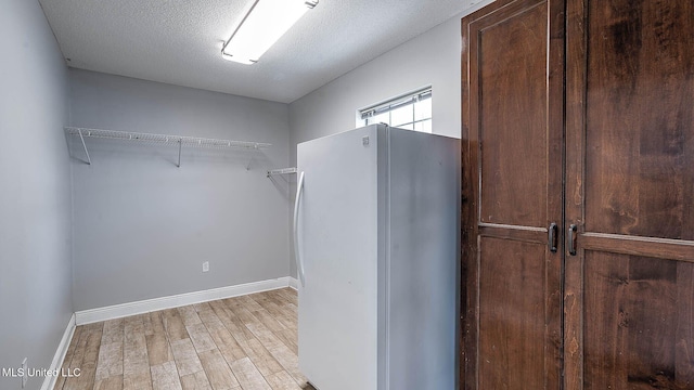 8 Skeeter Ln, Carriere, MS 39426 - walk in closet featuring light wood-type flooring