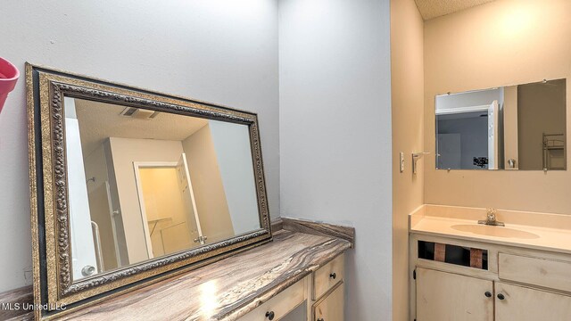 8 Skeeter Ln, Carriere, MS 39426 - bathroom featuring vanity and a textured ceiling