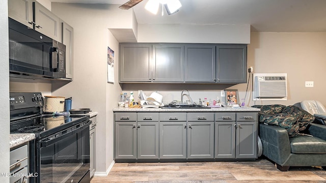 8 Skeeter Ln, Carriere, MS 39426 - kitchen featuring black appliances, gray cabinetry, and a sink