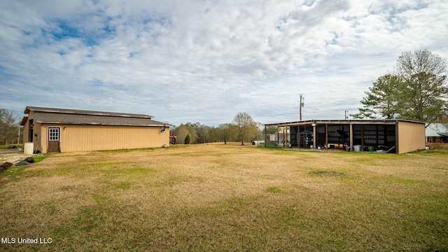8 Skeeter Ln, Carriere, MS 39426 - view of grassy yard featuring an outbuilding