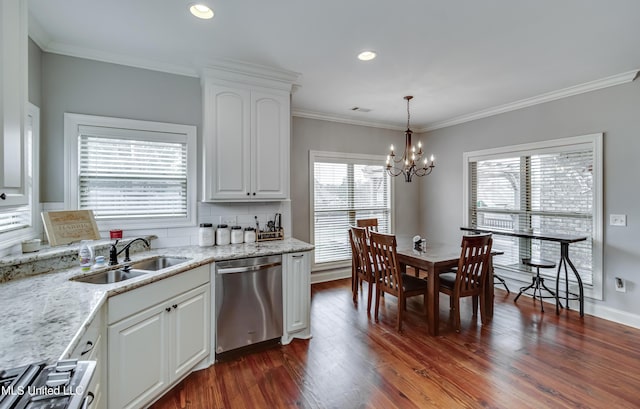 kitchen featuring pendant lighting, white cabinetry, dishwasher, sink, and dark hardwood / wood-style flooring