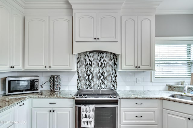 kitchen featuring white cabinets