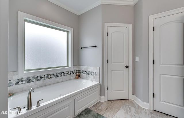 bathroom featuring crown molding and a bath