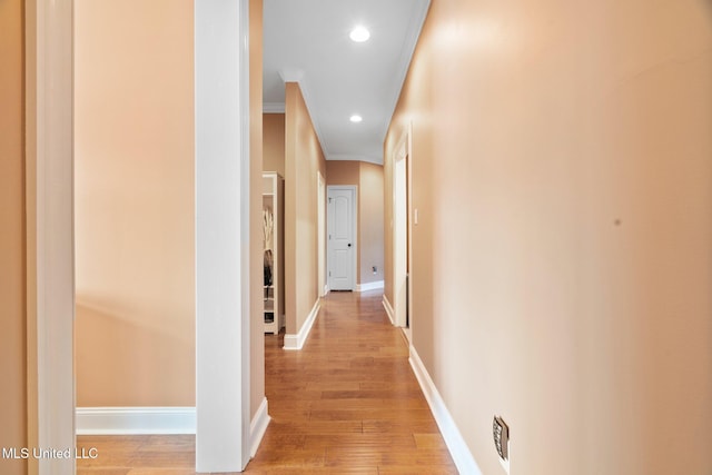 650 Bouldercrest Dr, Southaven, MS 38672 - hallway featuring baseboards, ornamental molding, recessed lighting, and light wood-style floors