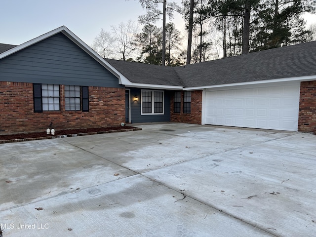 single story home with a garage