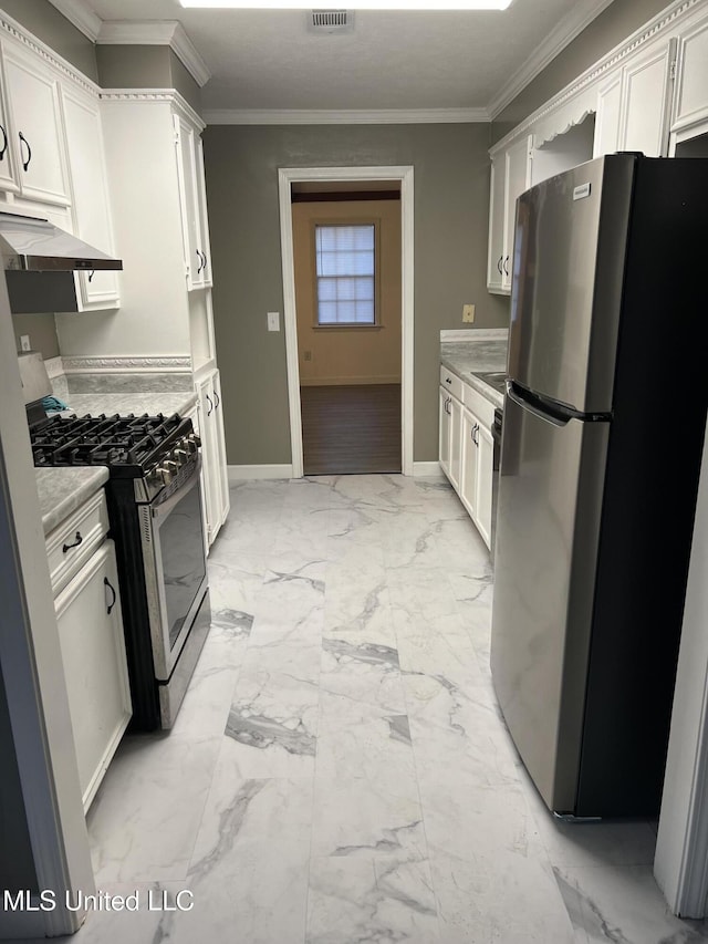 kitchen featuring white cabinetry, stainless steel appliances, extractor fan, and ornamental molding