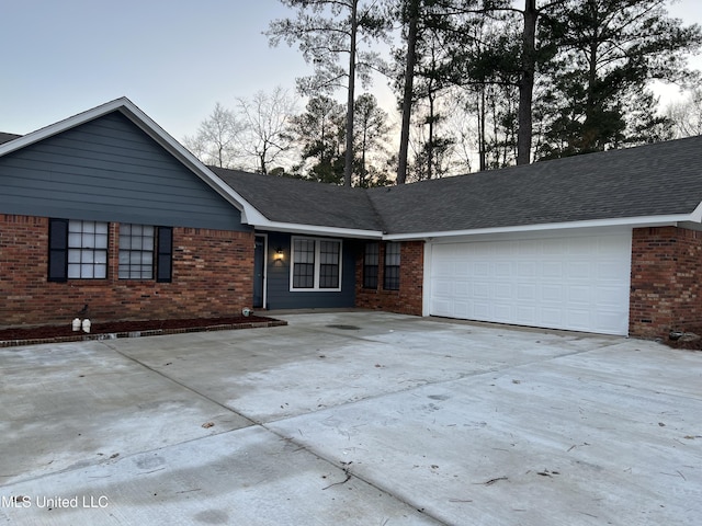 single story home with a garage