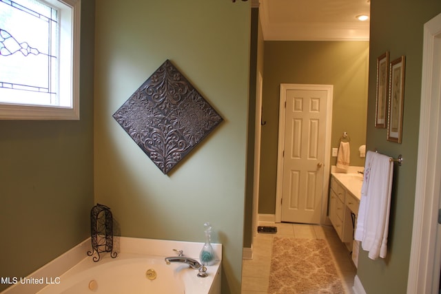 709 Oak Trl, Canton, MS 39046 - bathroom with tile patterned flooring, vanity, a tub with jets, and ornamental molding