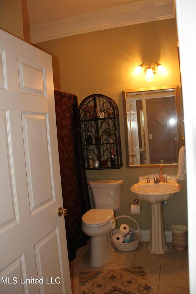 709 Oak Trl, Canton, MS 39046 - bathroom featuring crown molding and tile patterned floors