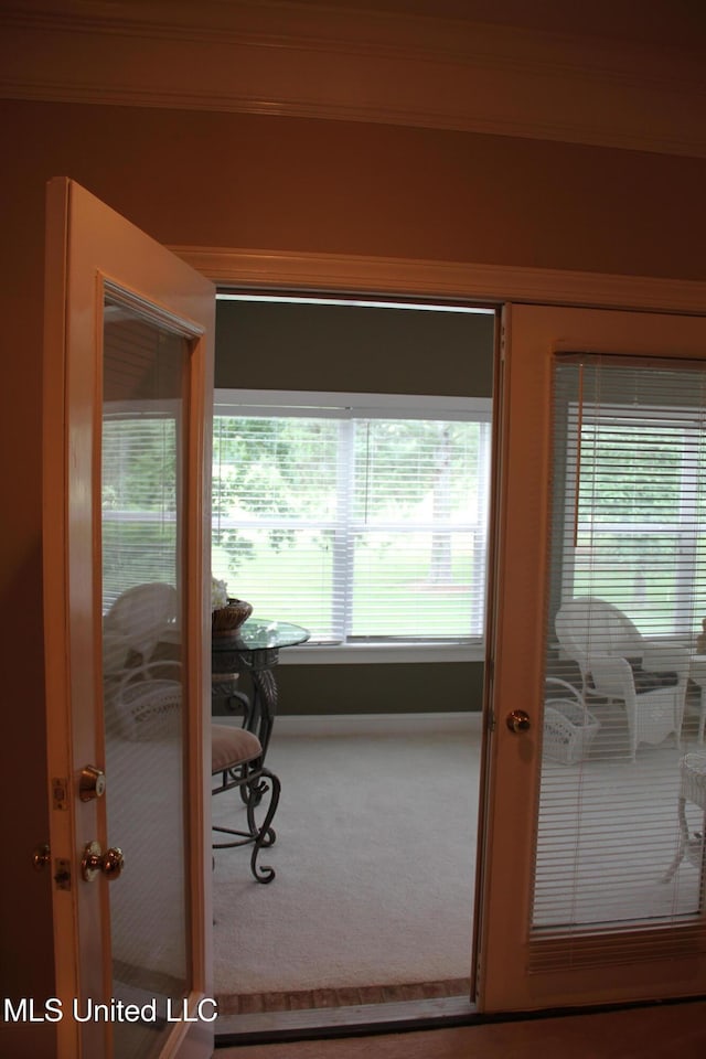 709 Oak Trl, Canton, MS 39046 - doorway with carpet, french doors, and crown molding