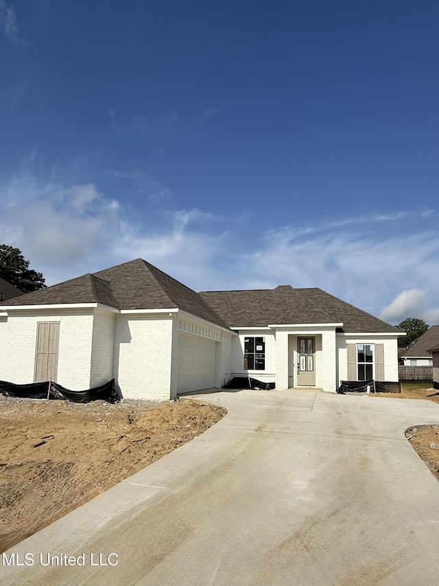 333 Willow Way, Canton, MS 39046 - view of home's exterior with concrete driveway and a garage