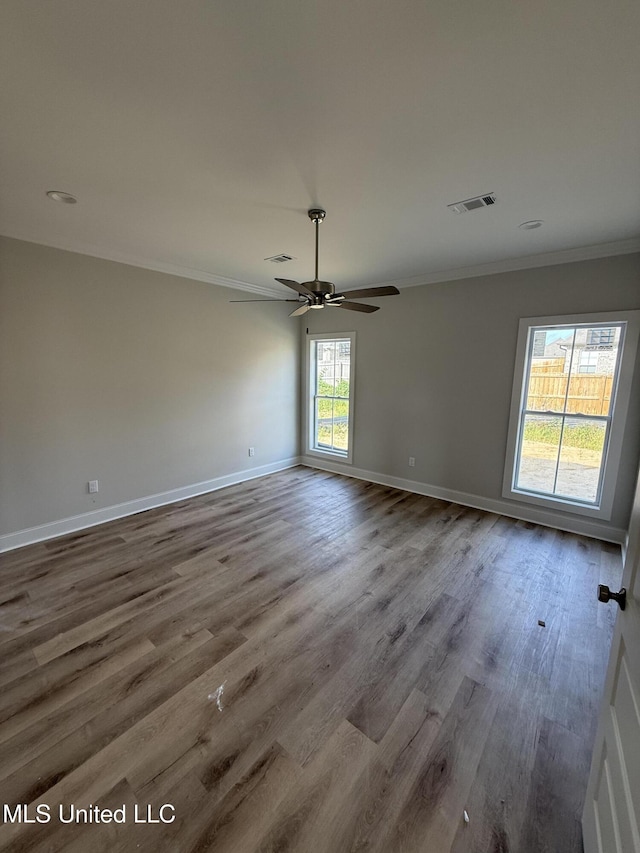 333 Willow Way, Canton, MS 39046 - spare room featuring crown molding, wood finished floors, ceiling fan, and baseboards