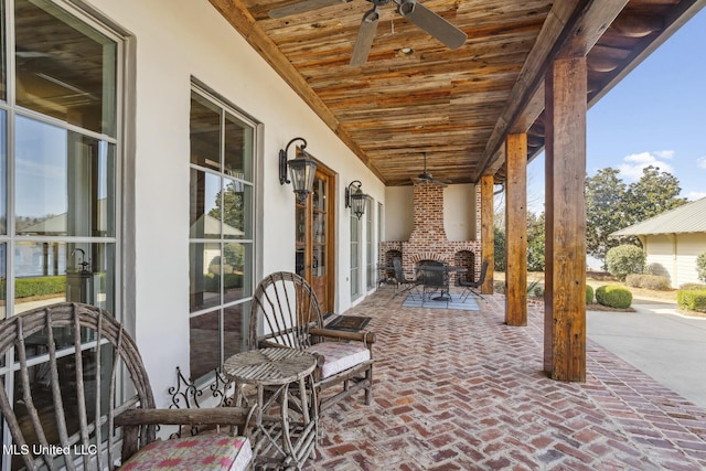 view of patio / terrace with outdoor dining space and ceiling fan