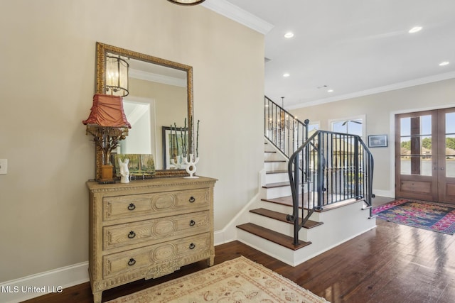 entryway featuring dark wood-style floors, french doors, stairs, and ornamental molding