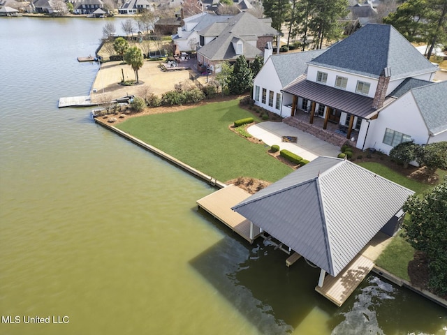 aerial view featuring a residential view and a water view