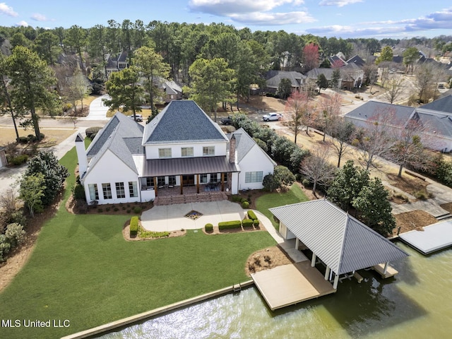 drone / aerial view featuring a water view