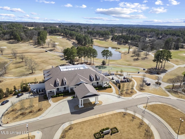 bird's eye view featuring golf course view and a water view