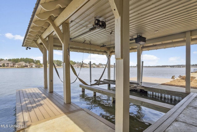 view of dock with a water view and boat lift