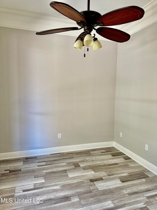 unfurnished room featuring ceiling fan, crown molding, and light hardwood / wood-style flooring