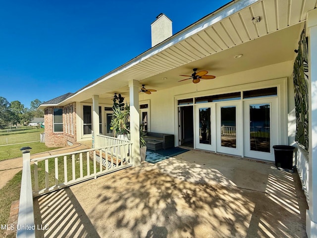 view of patio featuring ceiling fan and covered porch