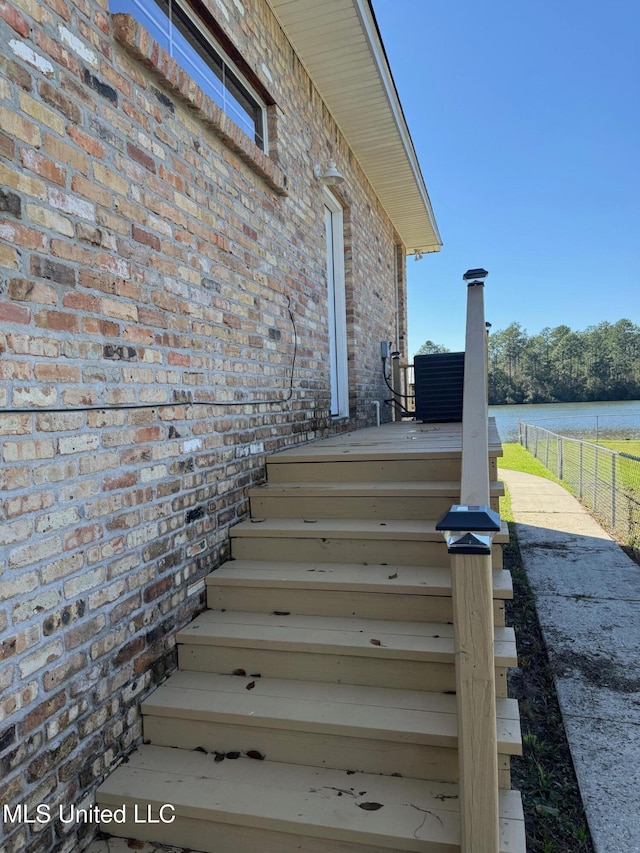 stairs featuring a water view