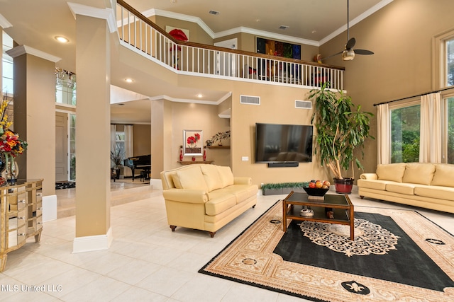 19592 Champion Cir, Gulfport, MS 39503 - living area with a high ceiling, crown molding, tile patterned floors, a ceiling fan, and recessed lighting