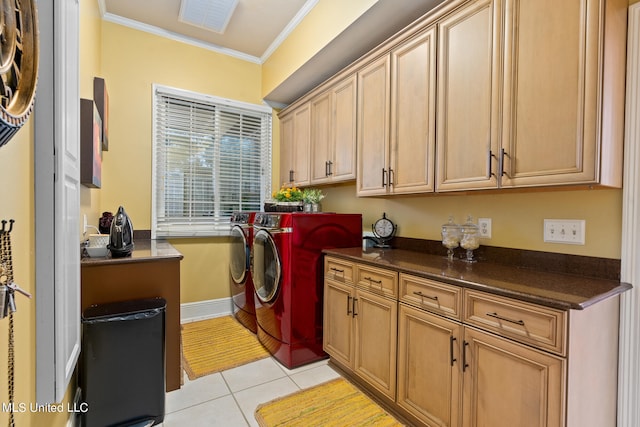19592 Champion Cir, Gulfport, MS 39503 - laundry room featuring washer and clothes dryer, cabinet space, ornamental molding, light tile patterned floors, and baseboards