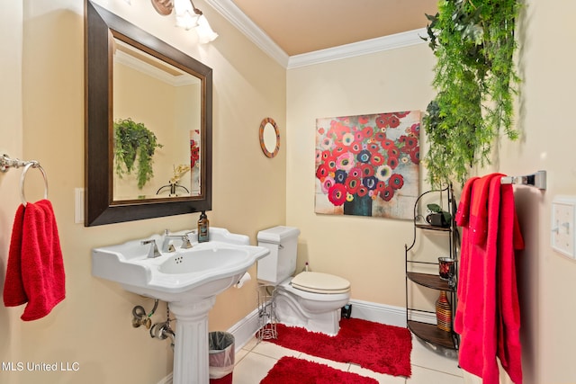 19592 Champion Cir, Gulfport, MS 39503 - bathroom featuring crown molding, toilet, tile patterned floors, and baseboards