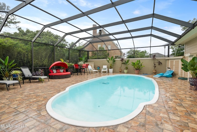 19592 Champion Cir, Gulfport, MS 39503 - outdoor pool with a patio and glass enclosure