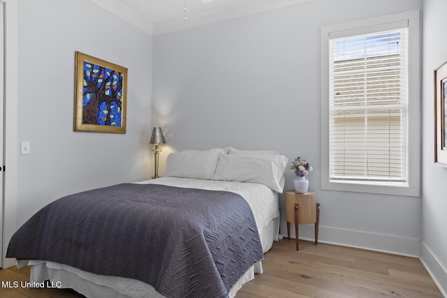 bedroom featuring light wood-type flooring