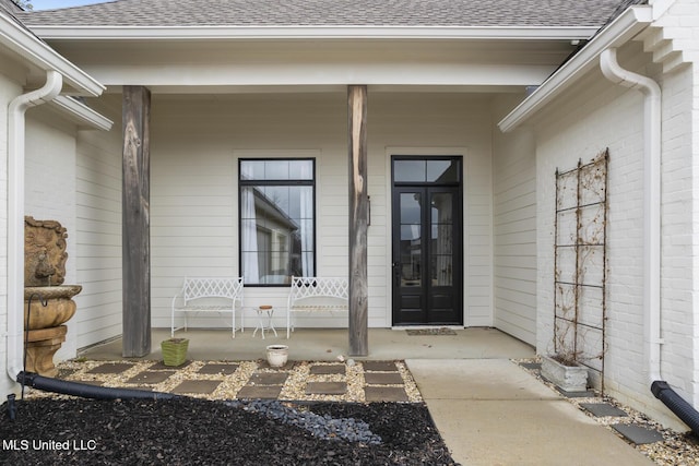 doorway to property with a porch