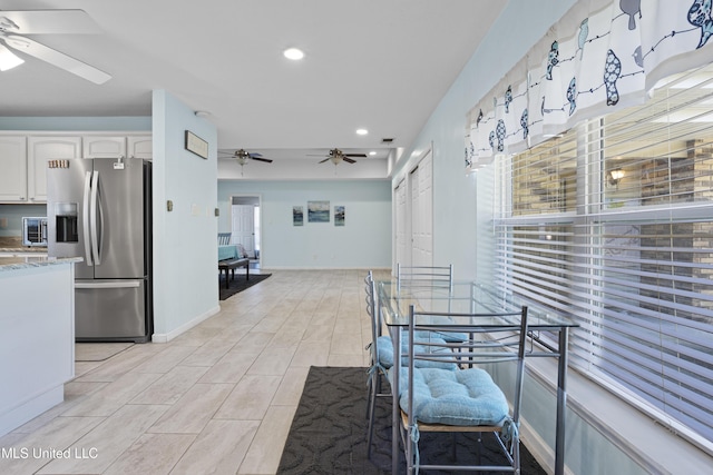 dining room featuring recessed lighting, ceiling fan, and baseboards