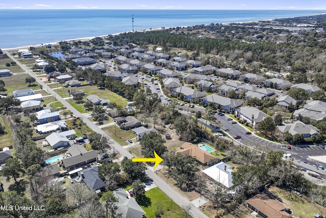 aerial view with a residential view and a water view