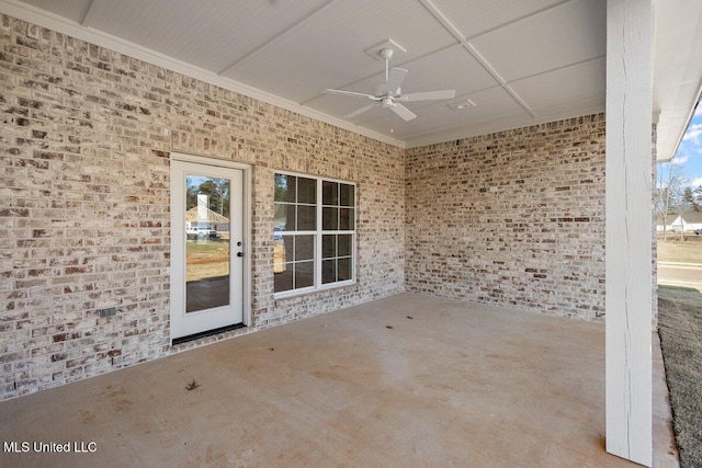 view of patio featuring a ceiling fan