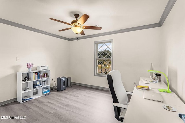 office area featuring light hardwood / wood-style floors, ceiling fan, and ornamental molding