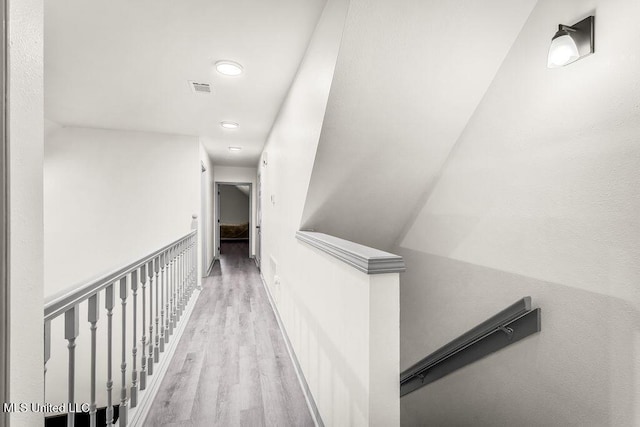 hallway featuring light hardwood / wood-style flooring