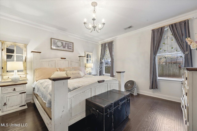 bedroom with a chandelier, dark hardwood / wood-style floors, and crown molding