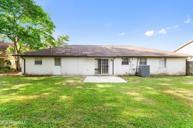 848 Carolee Cir, Biloxi, MS 39532 - rear view of house with brick siding, a patio, a yard, and cooling unit