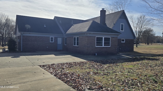 rear view of house featuring a patio area