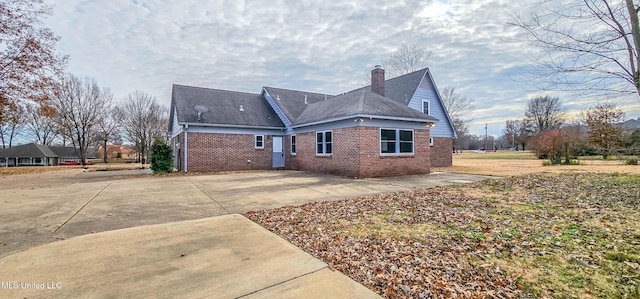 rear view of house featuring a patio